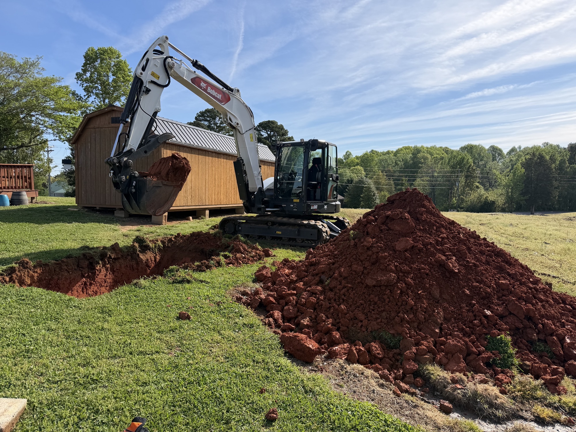Perrin's crew operating equipment on a job site